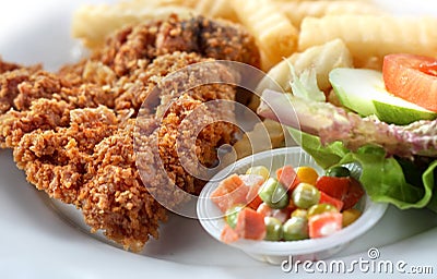 Fried Chicken chop and chips with salad Stock Photo