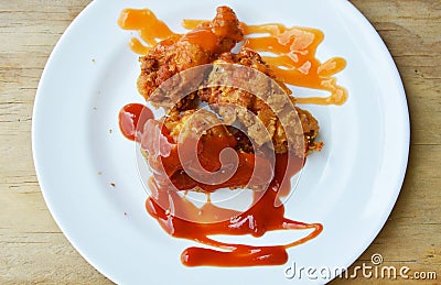 Fried chicken dressing ketchup and chili sauce on white dish Stock Photo
