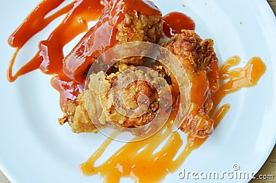 Fried chicken dressing ketchup and chili sauce on white dish Stock Photo