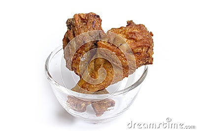 Fried chicken with glass bowl on white background Stock Photo