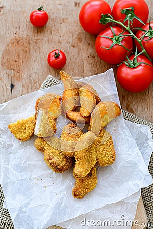 Fried chicken nuggets and wedges potatoes Stock Photo