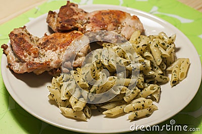 Fried chicken with pasta Stock Photo