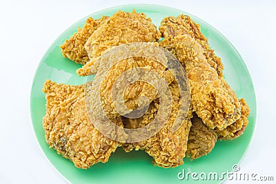 Fried chicken on a plate with white background Stock Photo