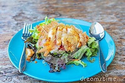 Fried chicken salad on green clean and healthly diet food. Stock Photo