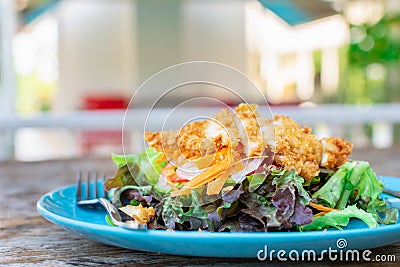 Fried chicken salad on green clean and healthly diet food. Stock Photo