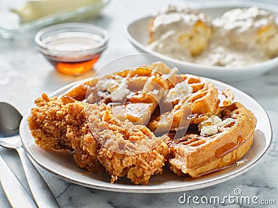 Fried chicken and waffles breakfast with syrup Stock Photo