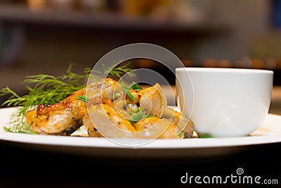 Fried chicken wings with source on white plate Stock Photo