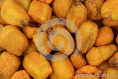 Fried crispy corn grain background Stock Photo