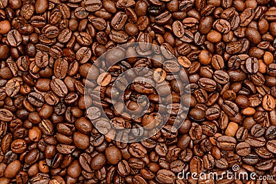 Fried dark Coffee beans background Stock Photo