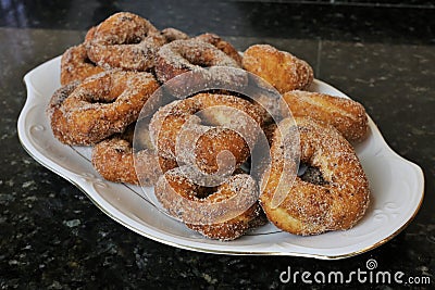 Fried donuts with sugar a typical sweet in Easter and Lent