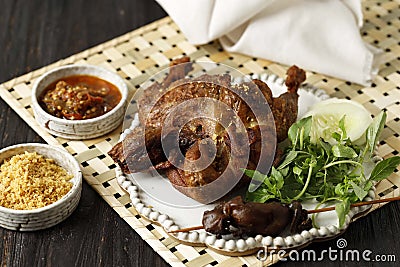 Fried Duck or Bebek Goreng, Indonesian Traditional Dish Made from Deepn Fried Duck with Spice Stock Photo