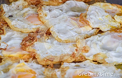 Fried egg Arranged on tray. Many fried eggs are arranged in shop, Delicious and cheap food, Protien from egg Stock Photo