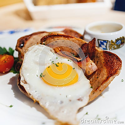 Fried egg over a bacon Stock Photo