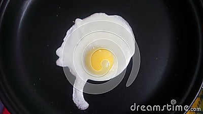 Fried egg snape like alien Stock Photo