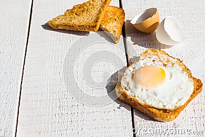 Fried egg on toast, snack, breakfast, white background Stock Photo