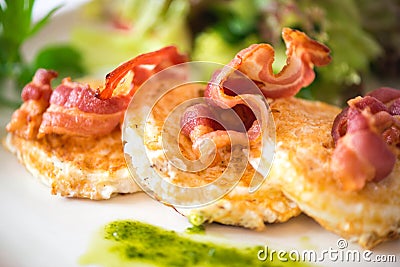 Fried eggs with bacon Stock Photo