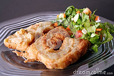 Fried fish filet in dish Stock Photo