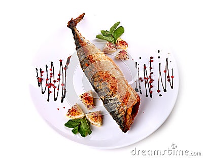 Fried fish with a lemon pieces Stock Photo