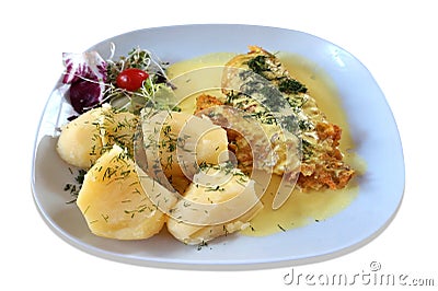 Fried fish - rose fish, salad and potatoes on plate Stock Photo