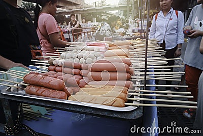 Fried food and meat ball with sticks, Thai street food market, exotic food, Bangkok, Thailand. On Mar 10, 2019 Editorial Stock Photo