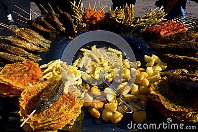 Fried food snacks at roadside market Stock Photo