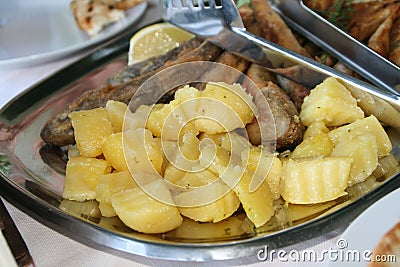 Fried goby fish with potato Stock Photo