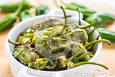 Fried Green Padron Peppers in White Bowl Stock Photo