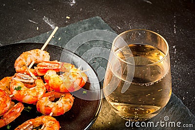 Fried grilled shrimp prawns with white wine Stock Photo