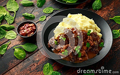 Fried Liver, bacon in onion gravy with mashed potato Stock Photo