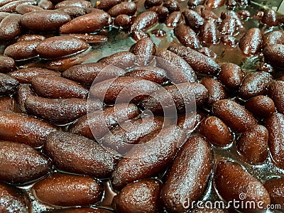 Fried long sweet lyancha of shaktigarh dipped in sugar syrup. lengcha Stock Photo