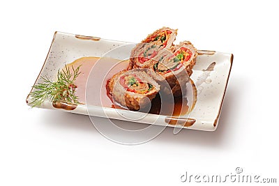 Fried meat roll with sauce and dill Stock Photo