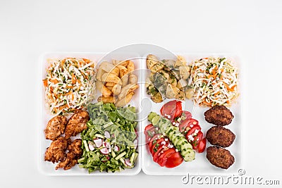 Fried meatballs and chicken with salad and potatoes - copy space Stock Photo