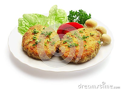 Fried meatballs decorated with mushrooms Stock Photo