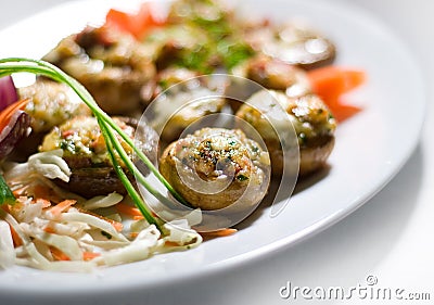 Fried mushrooms in garlic sauce Stock Photo