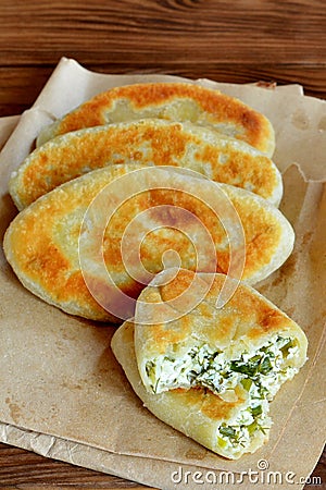 Fried pies with cottage cheese filling. Stock Photo