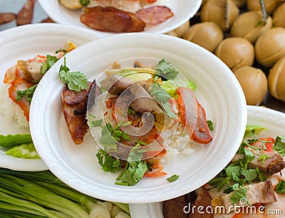 fried pork and Crispy Pork over the steam rice Stock Photo