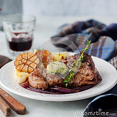 Fried Pork with Herb Butter and Mashed Potatoes Stock Photo