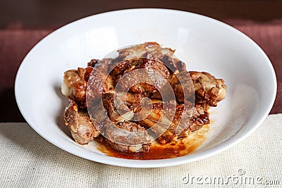 Fried Pork Stips on a White Surface Stock Photo