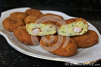 Fried potato and prawns appetizer