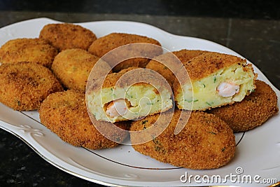 Fried potato and prawns appetizer