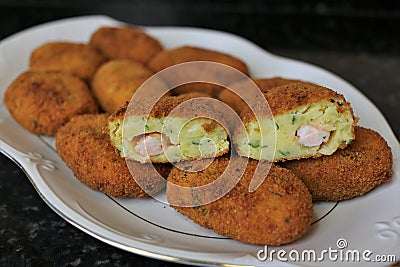 Fried potato and prawns appetizer