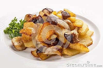 Fried potatoes with mushrooms on a white plate. Russian traditional dish Stock Photo