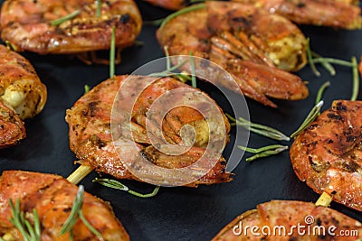Fried prawns with fresh rosmarin. Stock Photo