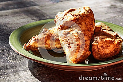 Fried roasted chicken close up. Stock Photo