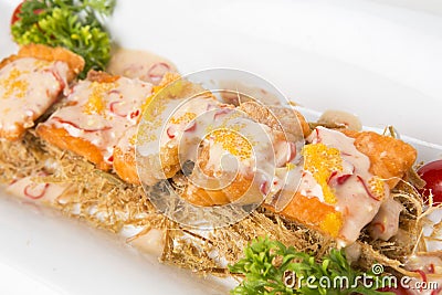 Fried salmon top with cream salad sauce Stock Photo