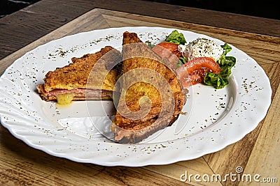 Fried sandwich with salad Stock Photo