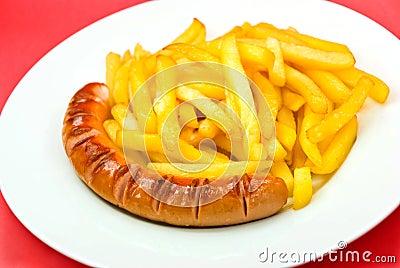 Fried sausage with french fries Stock Photo