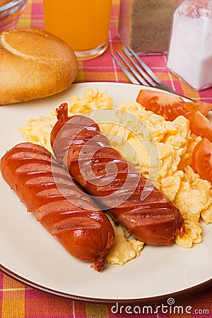 Fried sausage and scrambled eggs Stock Photo