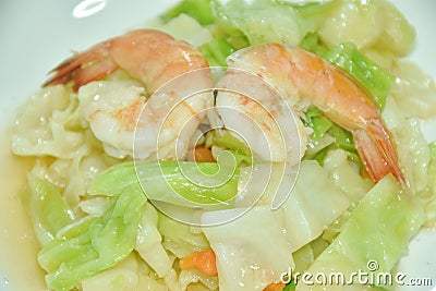 fried slice cabbage with shrimp in soy sauce on plate Stock Photo