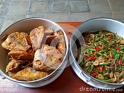 Fried snapper and stir-fried vegetables with mushroom beans Stock Photo